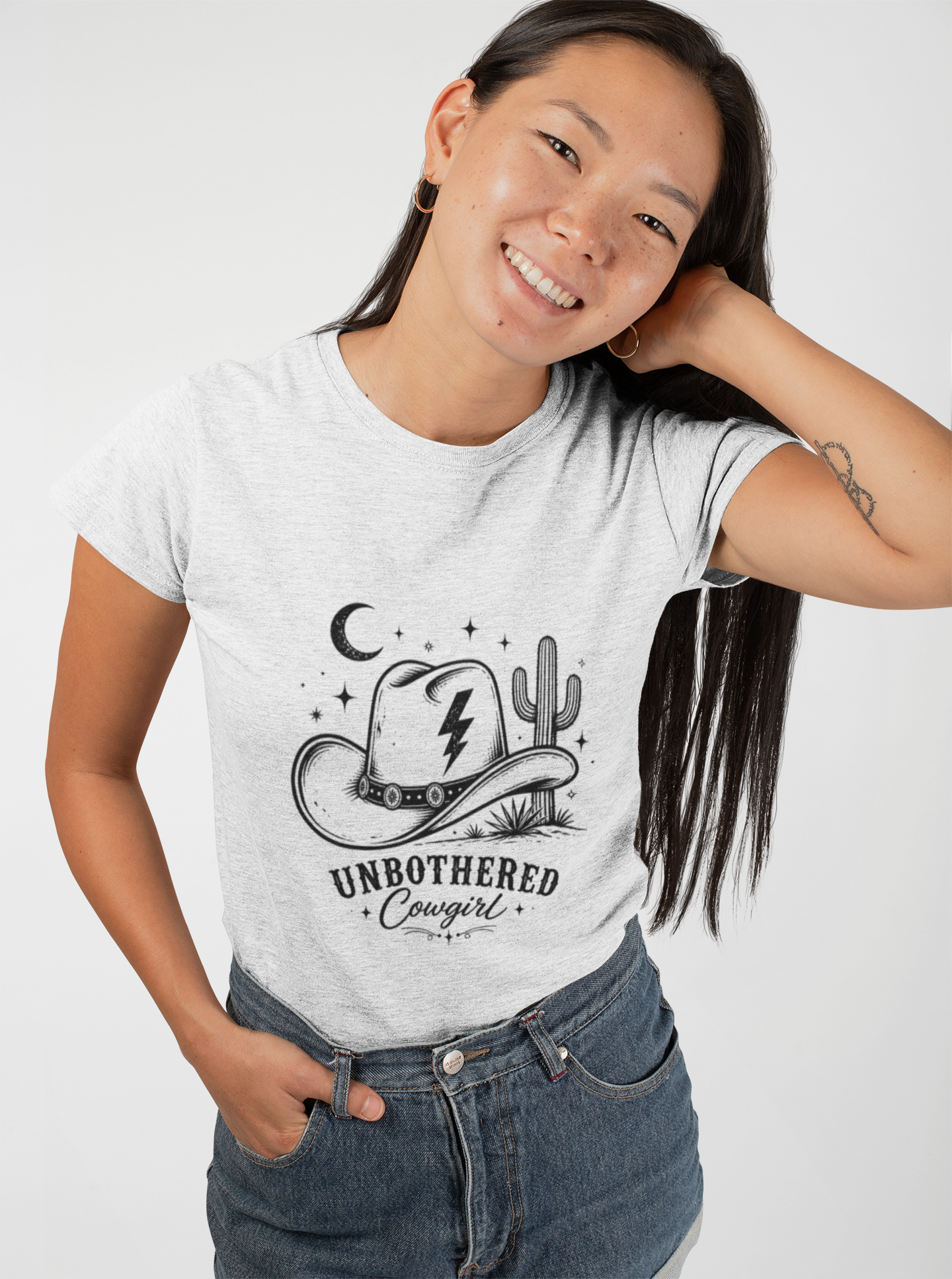 Unbothered Cowgirl Graphic Tee — Western Cowboy Hat & Cactus Design